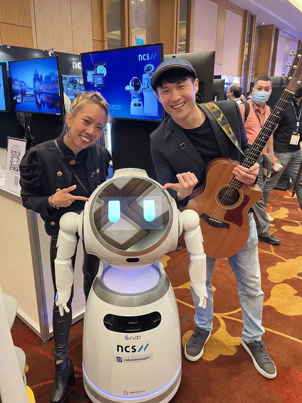 Roseville with a robot at a technology expo