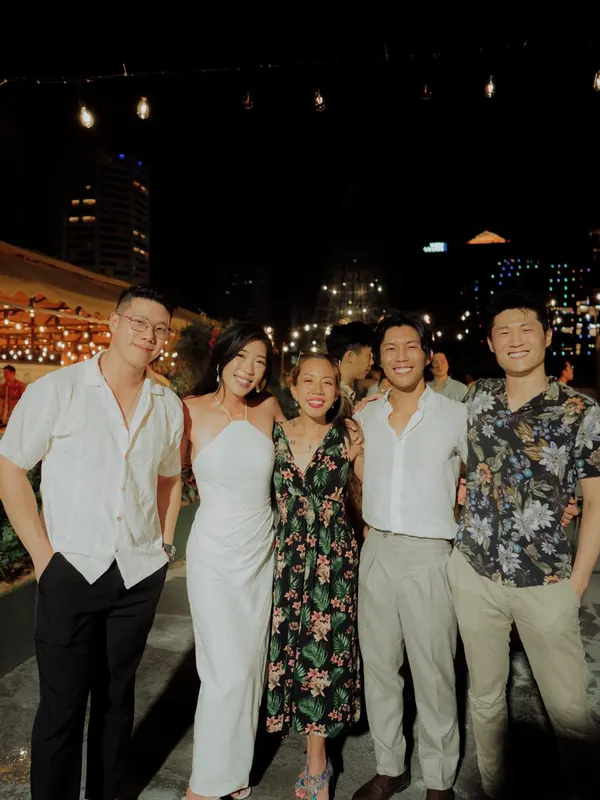 Roseville with the couple and friends at a night-time wedding